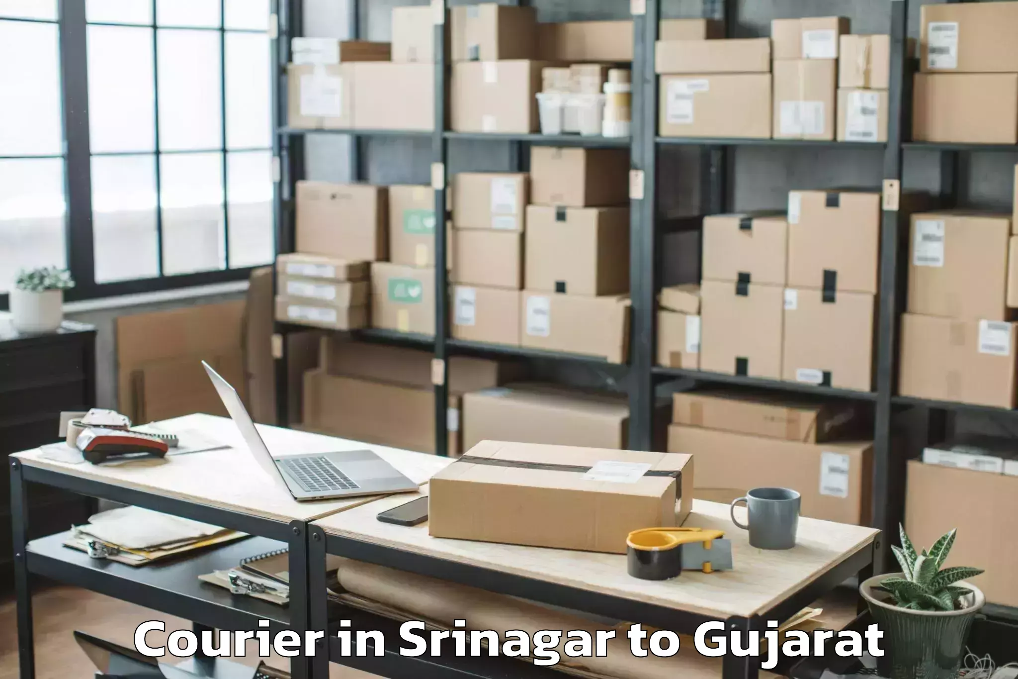 Get Srinagar to Lodhika Courier